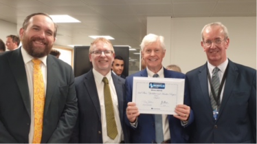 Mark Finney (left centre) and Richard Blyth (right centre) are presented with the Incentive Scheme Award. 